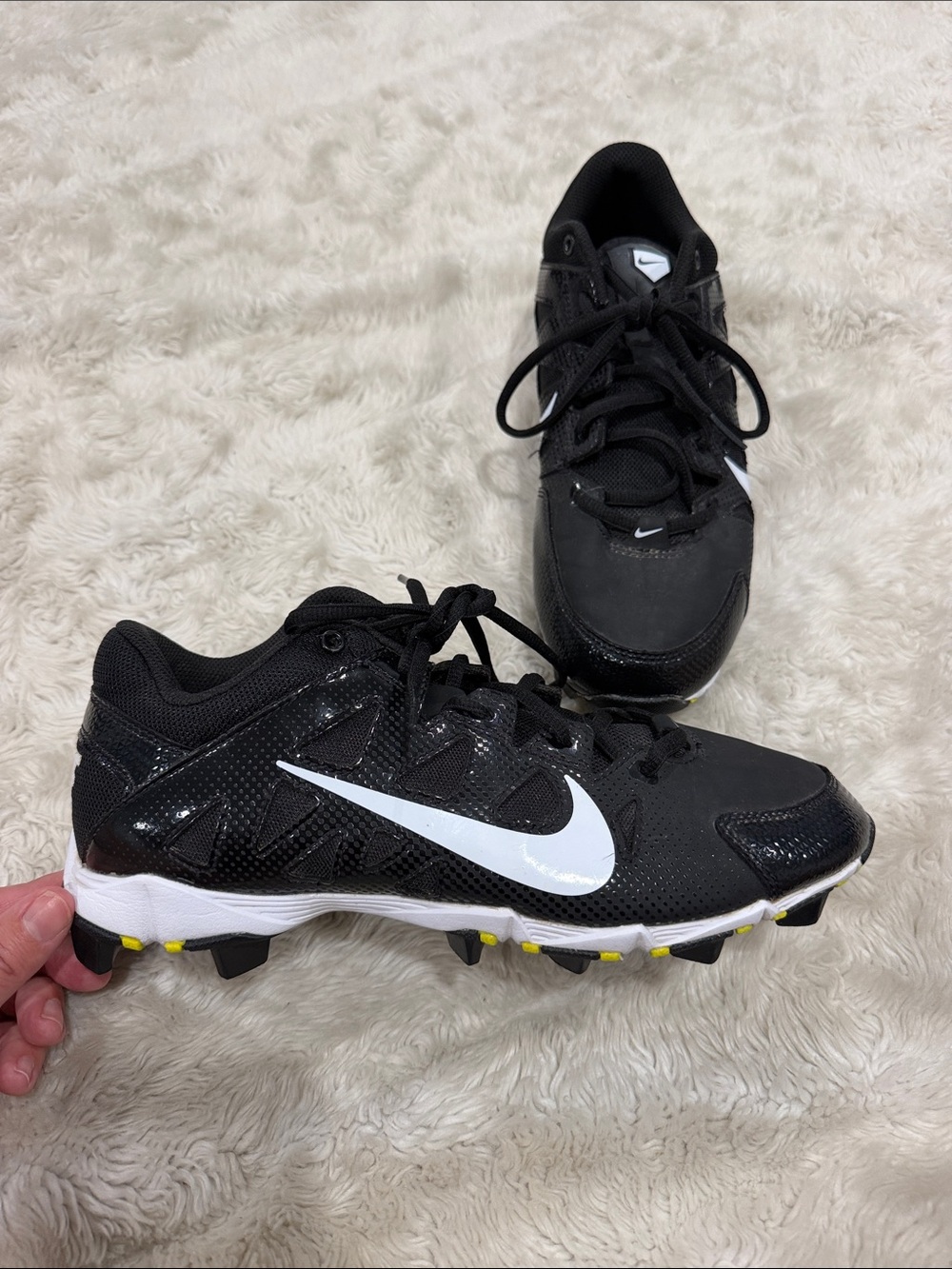 Nike Woman’s Black and White Softball Cleats with Yellow Accents Size 9